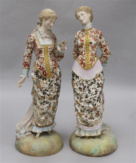 Two French painted biscuit porcelain figures of elegant ladies, late 19th century, height 35.5cm and 36cm